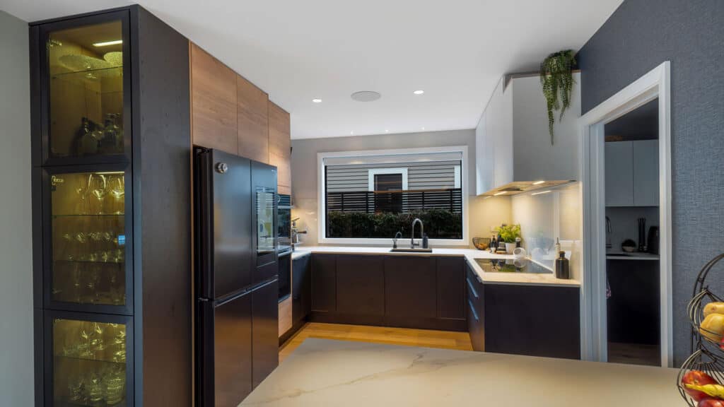 a kitchen with black appliances