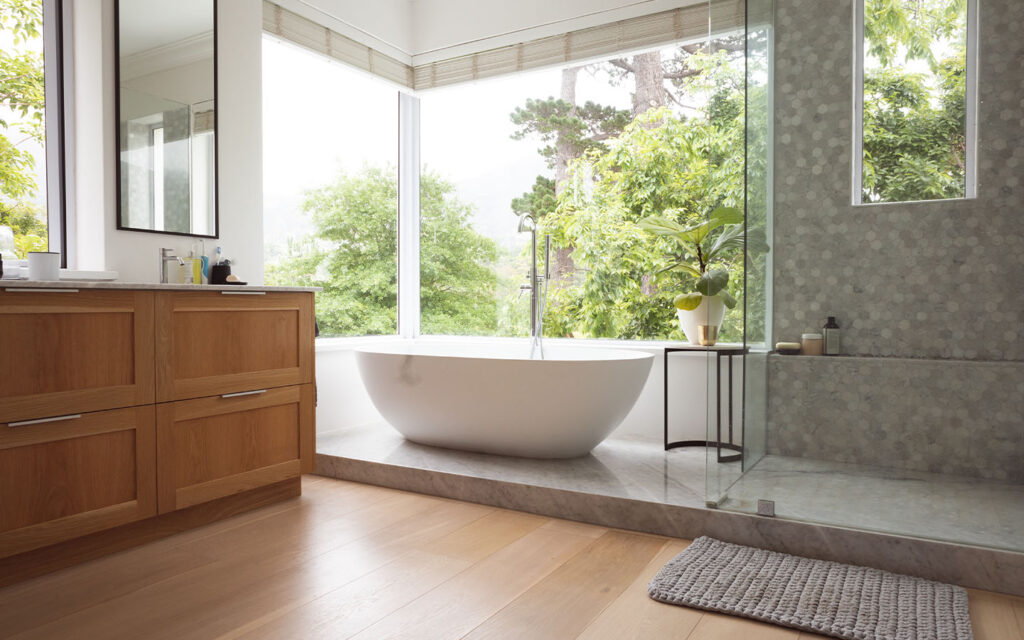 Modern bathroom with wood and tile floor and walls